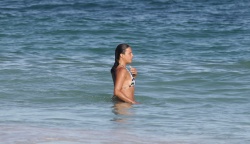 Michelle Rodriguez - Looked stunning in a bikini as she went for a dip in the sea in Tulum, Mexico, December 25, 2021