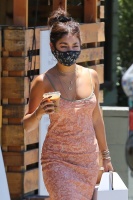 Vanessa Hudgens - dons cute orange dress while out getting takeout and coffee in Los Angeles, California | 07/03/2020