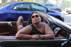 Lizzo - Cruises around in a convertible Bentley jamming out to her new song "Rumors" on Rodeo Drive in Beverly Hills, August 13, 2021