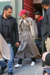 Zendaya - Donning a trenchcoat and carrying a Louis Vuitton bag, in the midst of promoting "Challengers" - New York City - April 25, 2024