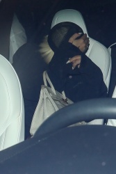 Lady Gaga - Isn't in the mood for cameras as she covers her head and hides while leaving dinner at Wally’s in Los Angeles, November 29, 2021