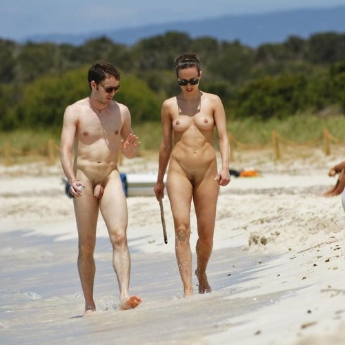 Nude men and women having sex