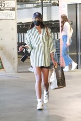 Laura Harrier - Shops for groceries wearing a cute boyfriend shirt in Los Angeles, November 5, 2021