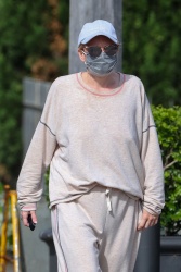 Rebel Wilson - Flaunts her slim and trim physique during her morning walk in Sydney, December 13, 2021
