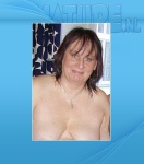 Mature Pavia (45) - Chunky mama gets it good in her living room  Mature.nl