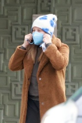 Ashley Tisdale - Stays warm in a brown coat while out getting herself some coffee in Los Feliz, January 8, 2023