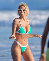 Tina Louise - Shows off her fit figure in a string bikini on a beach day at Venice Beach, May 3, 2021