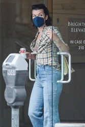 Milla Jovovich - Does some solo shopping on Rodeo Drive in Beverly Hills, November 1, 2021