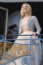 Elle Fanning - On a hotel balcony in Cannes France 05/24/2024