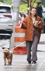Millie Bobby Brown - Takes her dog Winnie on a stroll with a stop at Starbuck's, New York City - April 18, 2024