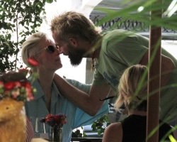 Tilda Swinton - Kisses her partner Sandro Kopp while at lunch with friends and her daughter Honor at the Santalucia restaurant in Rome, June 26, 2021