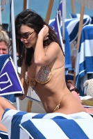 Emily Ratajkowski - Lounging in bikini in Miami February 16, 2024